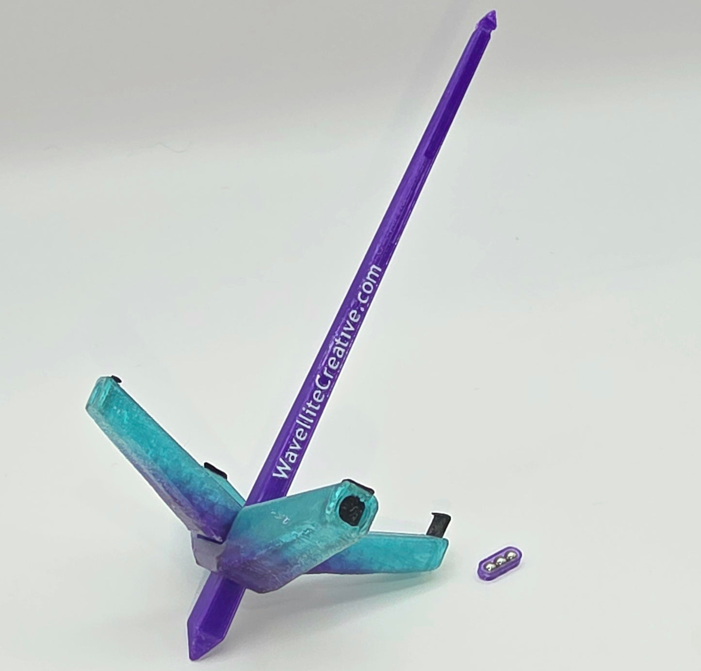 Roaming Wayfinder - Small, teal and purple black and white accents