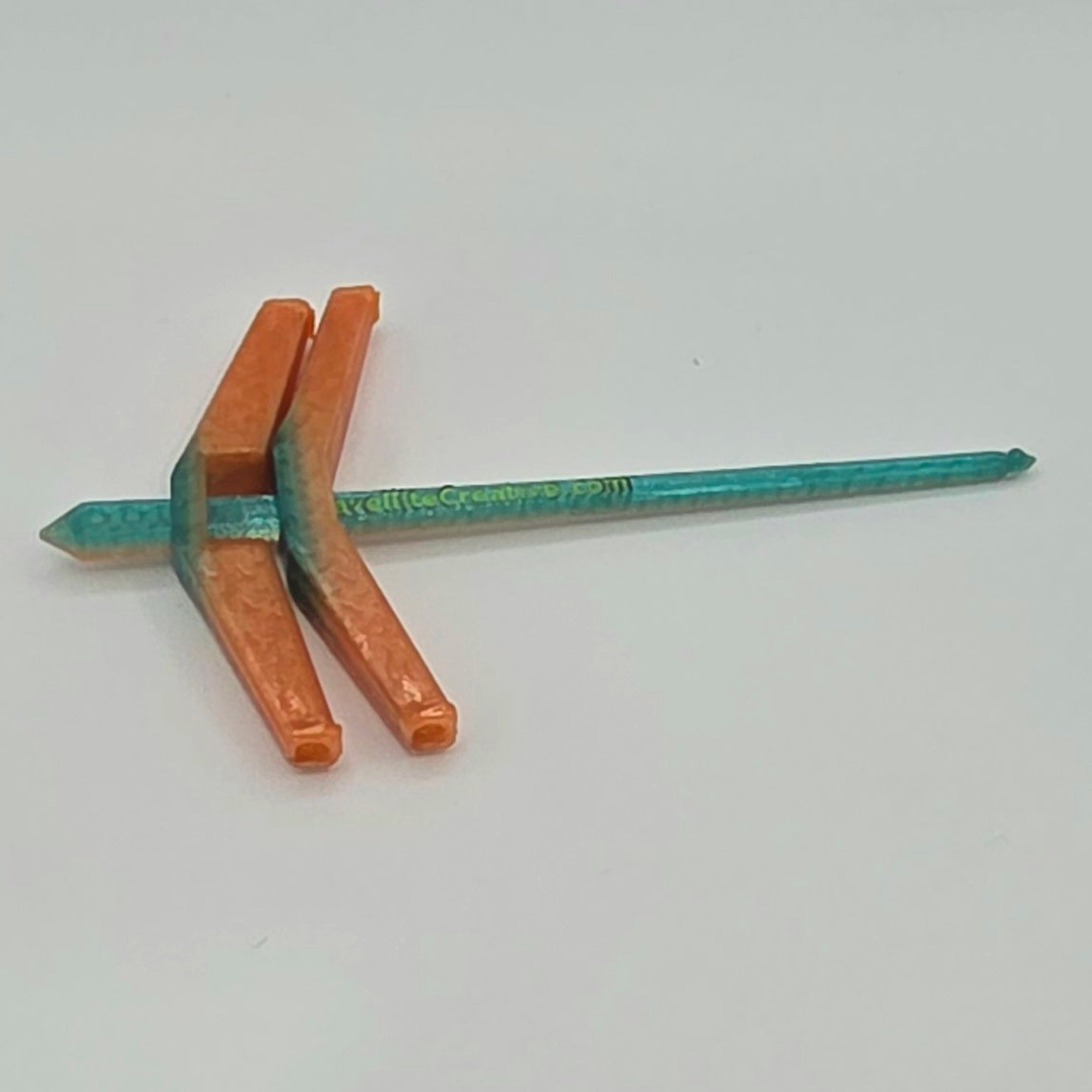 Roaming Wayfinder - Small, orange and teal with green accent