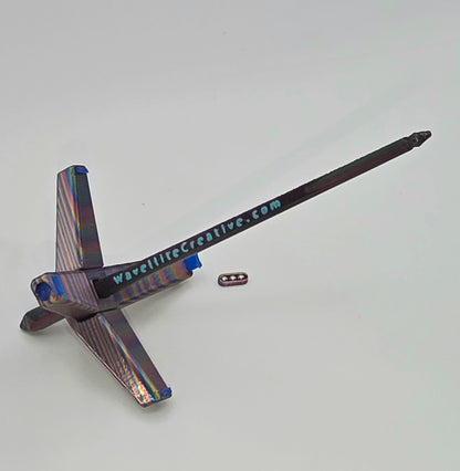 Roaming Wayfinder - Small, rainbow oil slick with blue accents